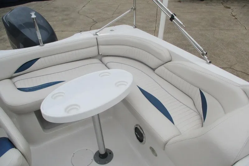 Slide: The Image of White and blue seating area on 2012 Starcraft 2009 OB Limited boat. - 6