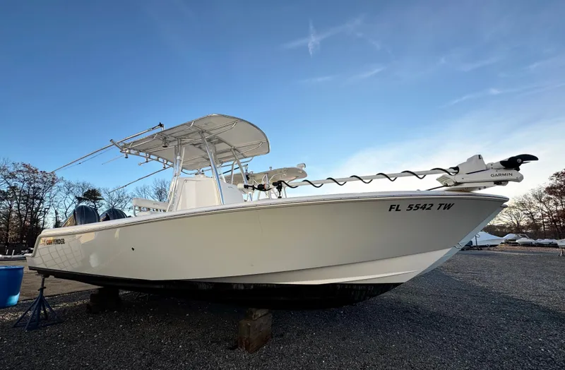 The Image of 2024 Contender 25 Tournament CC boat on display, featuring Garmin equipment. - 0