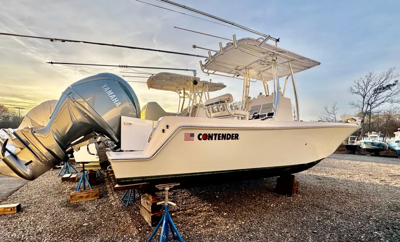 Slide: The Image of 2024 Contender 25 Tournament CC boat with Yamaha engine on display. - 14