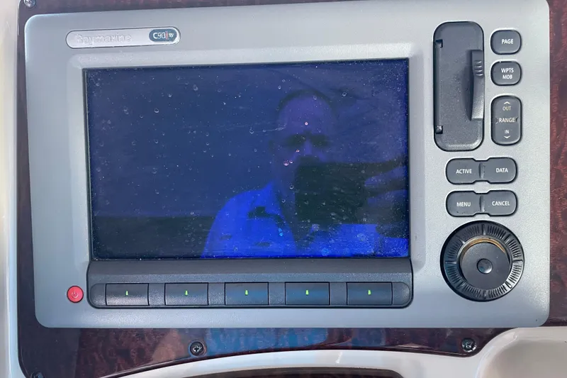 Slide: The Image of Raymarine C90W display on 2012 Sea Ray 330 Sundancer boat dashboard. - 11