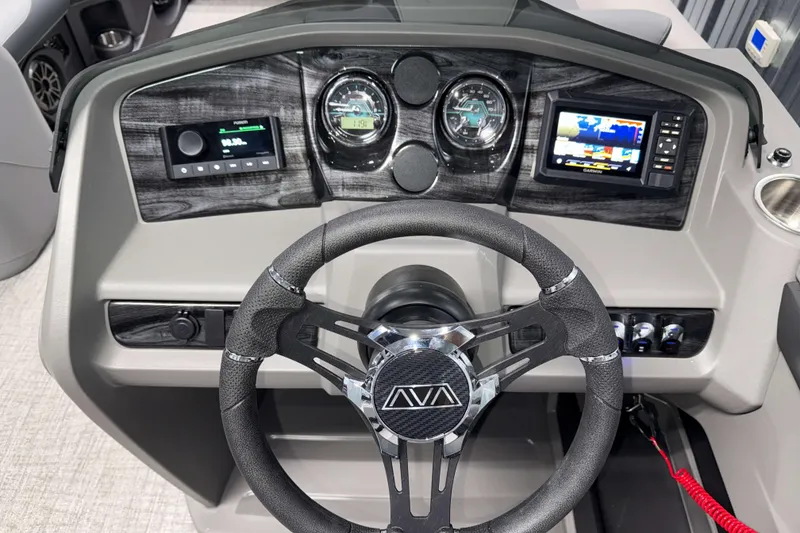 Slide: The Image of Steering console of 2026 Avalon LSZ 2385 Entertainer with modern controls and displays. - 11