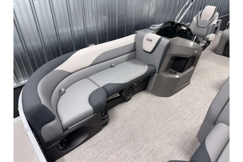 Slide: The Image of 2026 Avalon LSZ 2385 Entertainer pontoon boat interior with sleek seating and modern design. - 19