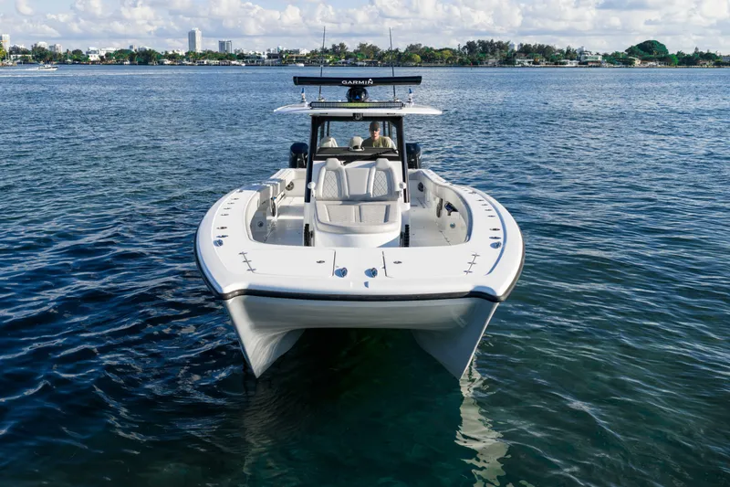 Slide: The Image of Aerial view of 2022 Freeman 43 boat on clear blue water. - 10