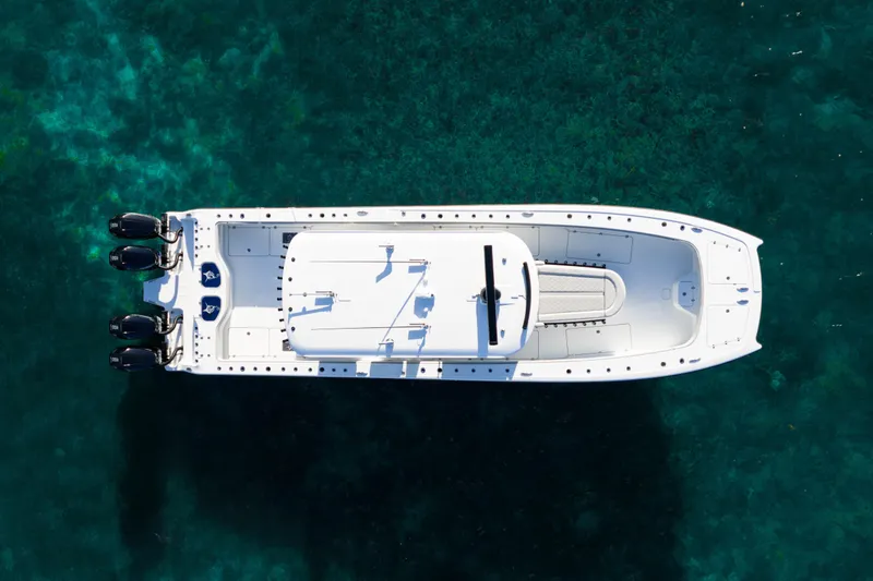 Slide: The Image of 2022 Freeman 43 boat with four powerful 400 V10 engines on open water. - 11