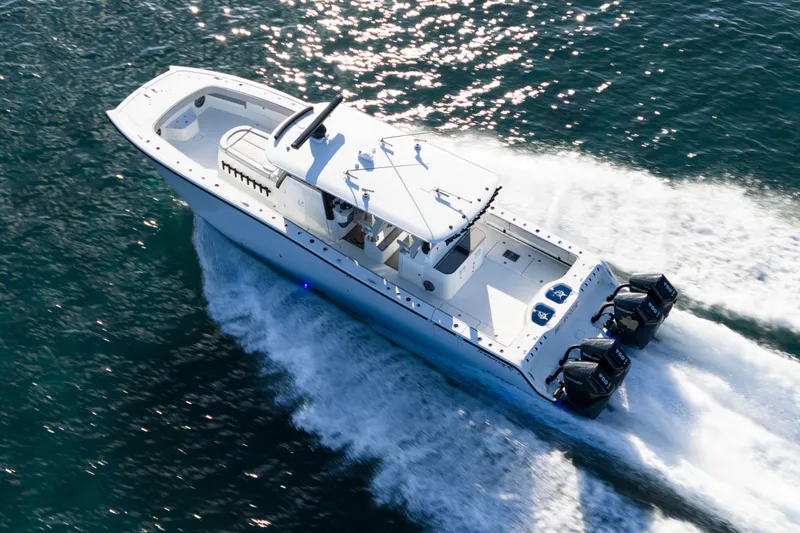 Slide: The Image of Aerial view of 2022 Freeman 43 boat cruising on open water. - 3