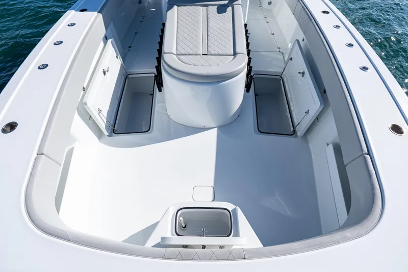 Slide: The Image of 2022 Freeman 43 boat with quad Mercury engines on a sunny day. - 32