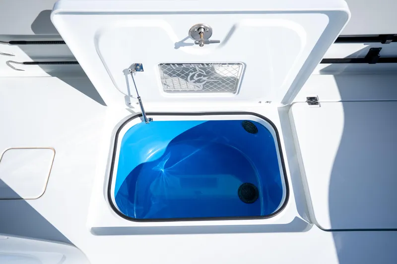 Slide: The Image of 2022 Freeman 43 boat deck with multiple outboard engines on water. - 37