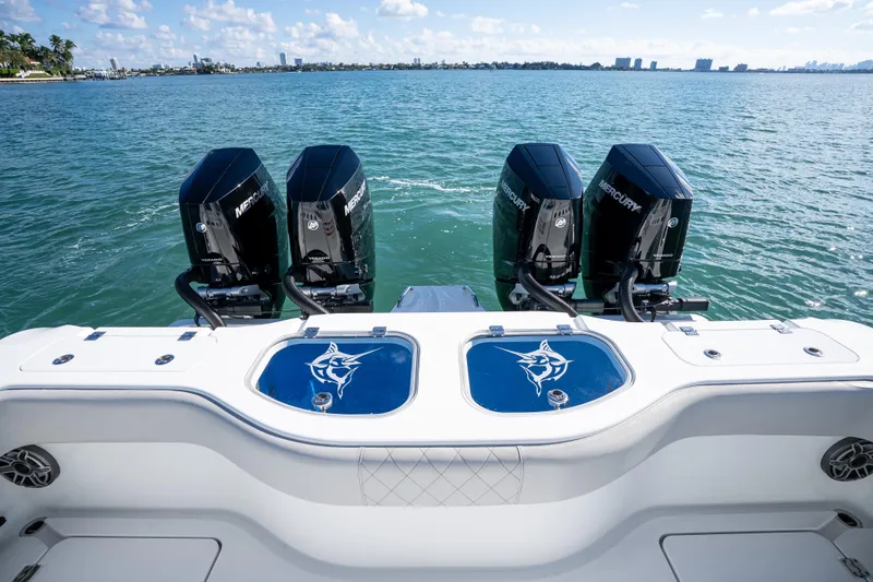 Slide: The Image of Freeman 43 boat with dual Mercury Verado engines on a sunny day, 2022 model. - 39