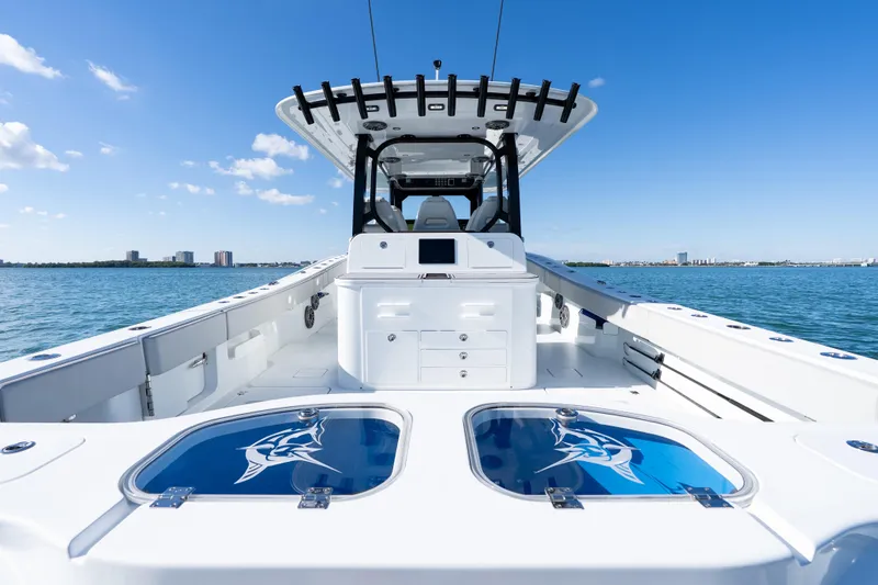 Slide: The Image of 2022 Freeman 43 boat interior with sleek white cabinetry and modern design. - 45