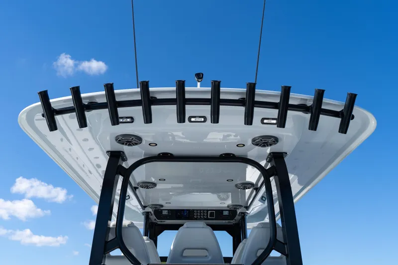 Slide: The Image of 2022 Freeman 43 boat interior with open storage drawers on a sunny day. - 47