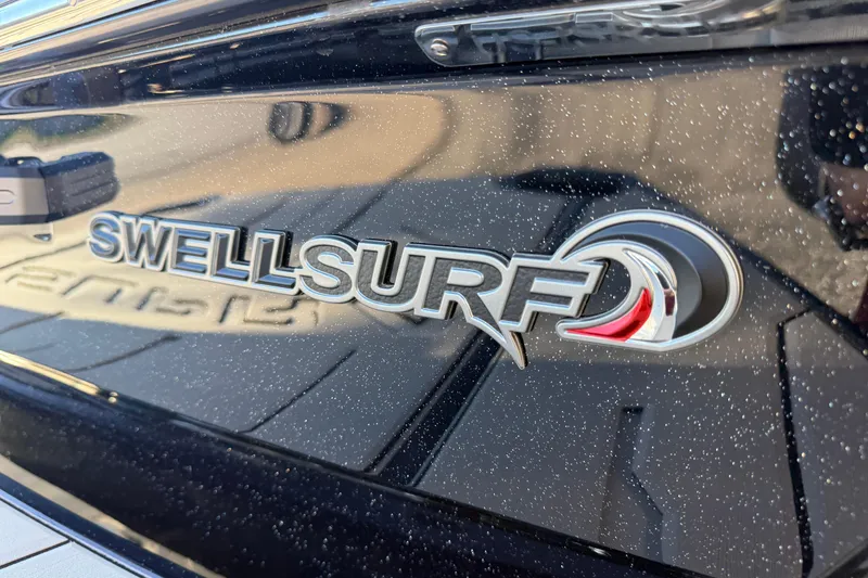 Slide: The Image of 2026 Supra SL 550 SwellSurf logo on sleek black exterior. - 10