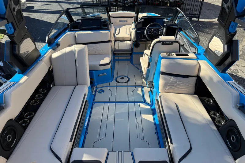 Slide: The Image of Luxurious interior of 2026 Supra SL 550 boat with spacious seating and modern design. - 20