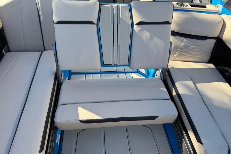 Slide: The Image of 2026 Supra SL 550 interior seating with modern design and blue accents. - 21