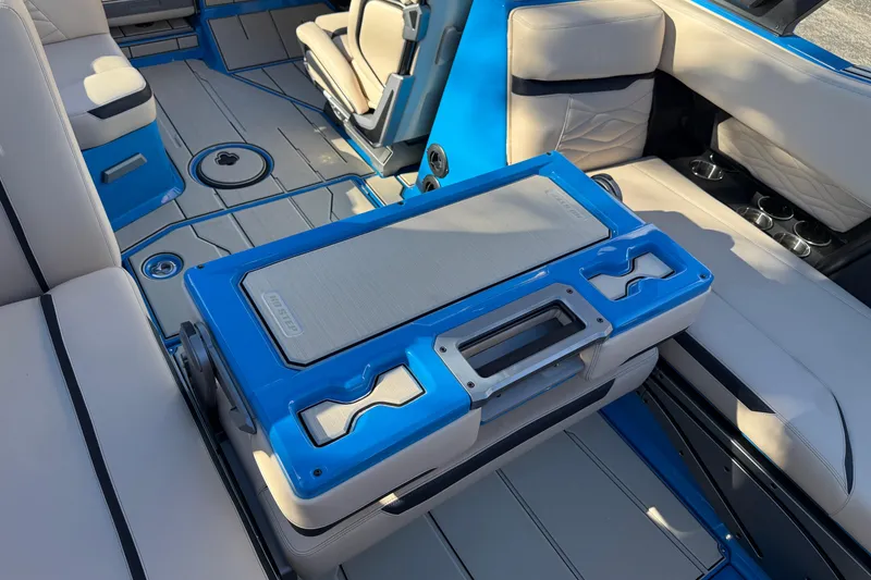 Slide: The Image of Luxurious interior of 2026 Supra SL 550 boat with blue and beige seating. - 22