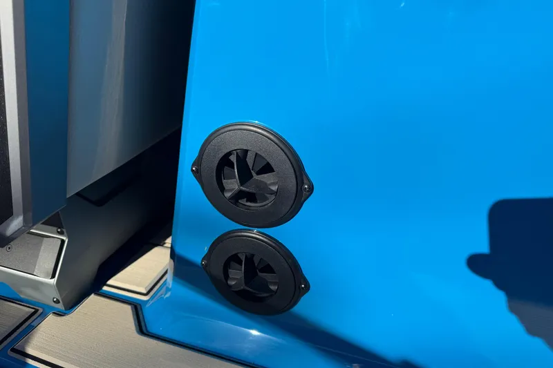 Slide: The Image of 2026 Supra SL 550 boat detail with blue exterior and dual vents. - 33