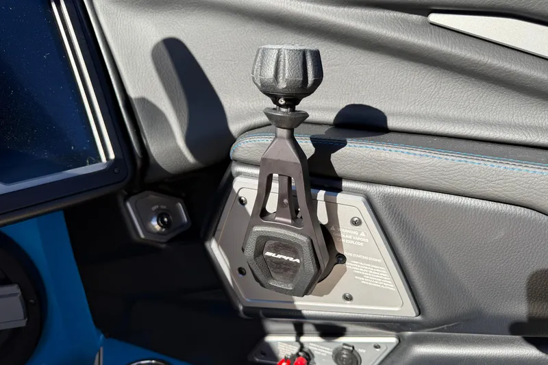 Slide: The Image of 2026 Supra SL 550 interior detail with gear lever and control panel. - 37