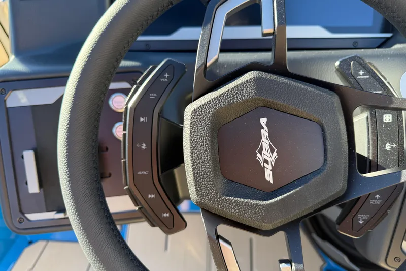 Slide: The Image of Steering wheel of 2026 Supra SL 550 with integrated controls and logo. - 41