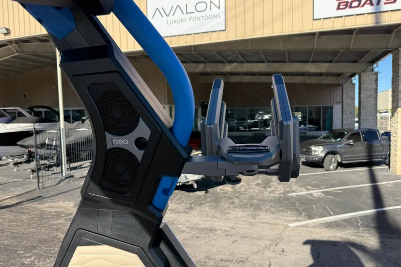 Slide: The Image of Close-up of a 2026 Supra SL 550 boat tower with speakers, in a dealership lot. - 54