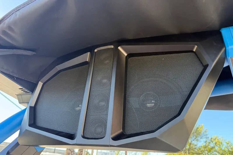 Slide: The Image of 2026 Supra SL 550 speaker system, featuring sleek black mesh design under a canopy. - 56