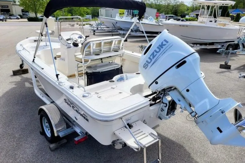 Slide: The Image of 2022 Sea Chaser 21 LX boat with Suzuki outboard motor on trailer. - 5