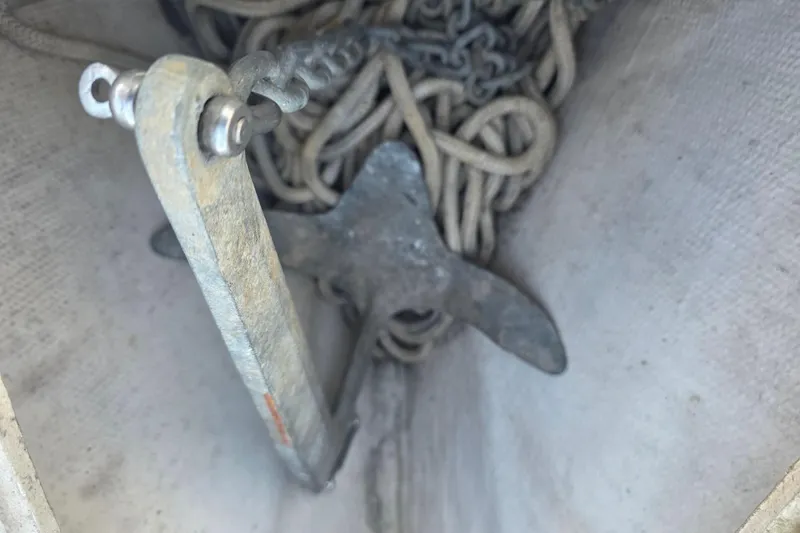 Slide: The Image of Anchor and ropes in a 1985 Express Yachting Express 30 sailboat. - 14