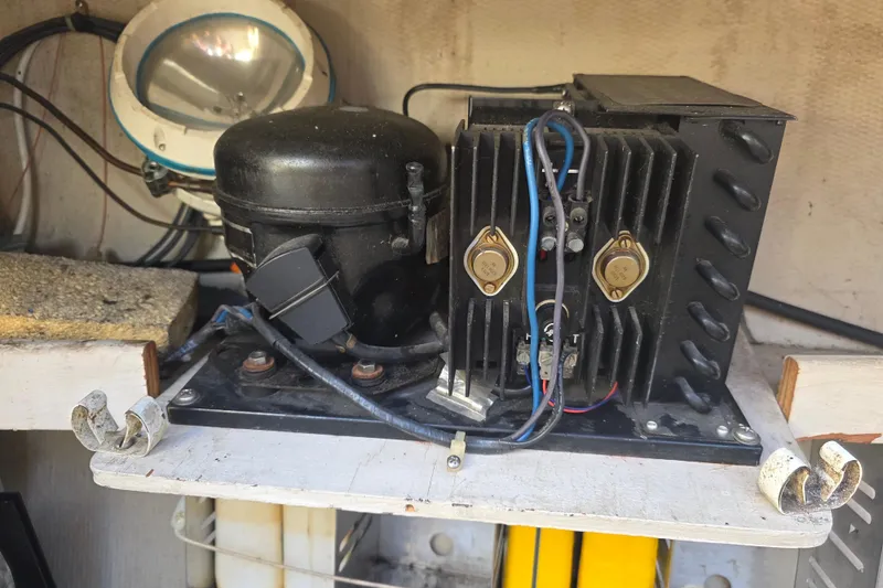 Slide: The Image of Electrical components inside a 1985 Express Yachting Express 30 boat. - 15