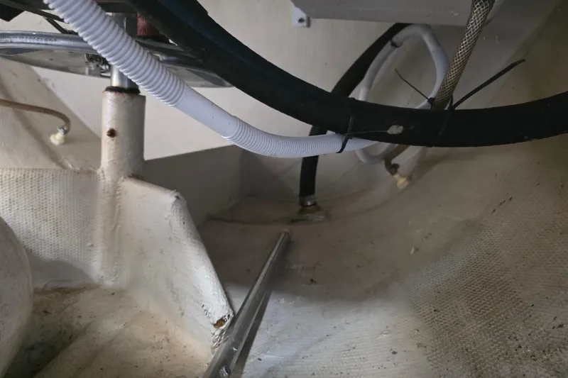 Slide: The Image of Interior view of 1985 Express Yachting Express 30 yacht showing wiring and structural details. - 22