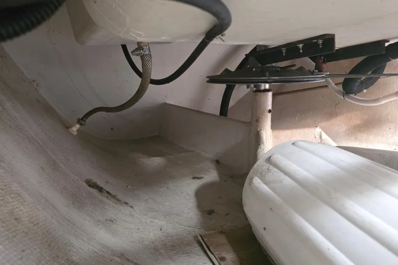 Slide: The Image of Interior view of 1985 Express Yachting Express 30 boat, showing pipes and fittings. - 23