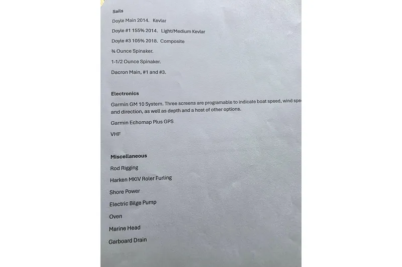 Slide: The Image of 1985 Express Yachting Express 30 features sails, electronics, and miscellaneous equipment details. - 50