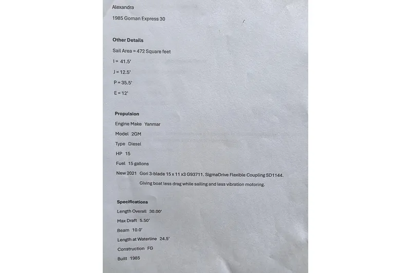 Slide: The Image of 1985 Express Yachting Express 30 specifications sheet with engine and sail details. - 51