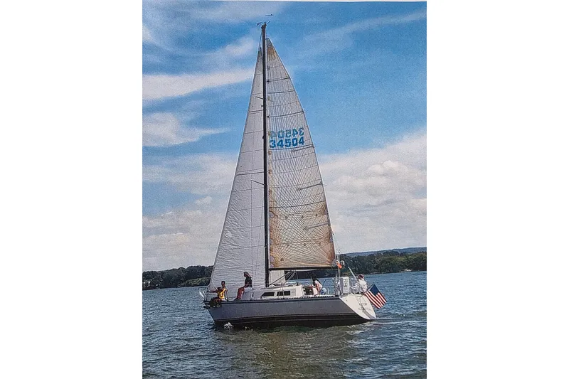 Slide: The Image of Sailing on a lake, 1985 Express Yachting Express 30 under clear skies. - 55
