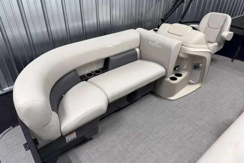 Slide: The Image of 2026 SunChaser Vista 16 LR boat interior with plush seating and cup holders. - 14