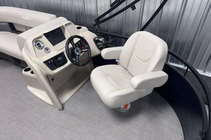 Slide: The Image of 2026 SunChaser Vista 16 LR boat interior with steering console and captain's chair. - 3