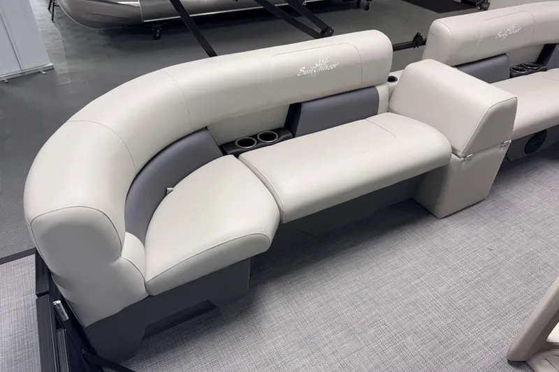 Slide: The Image of Luxurious seating on 2026 SunChaser Vista 16 LR pontoon boat, featuring elegant design and cup holders. - 4