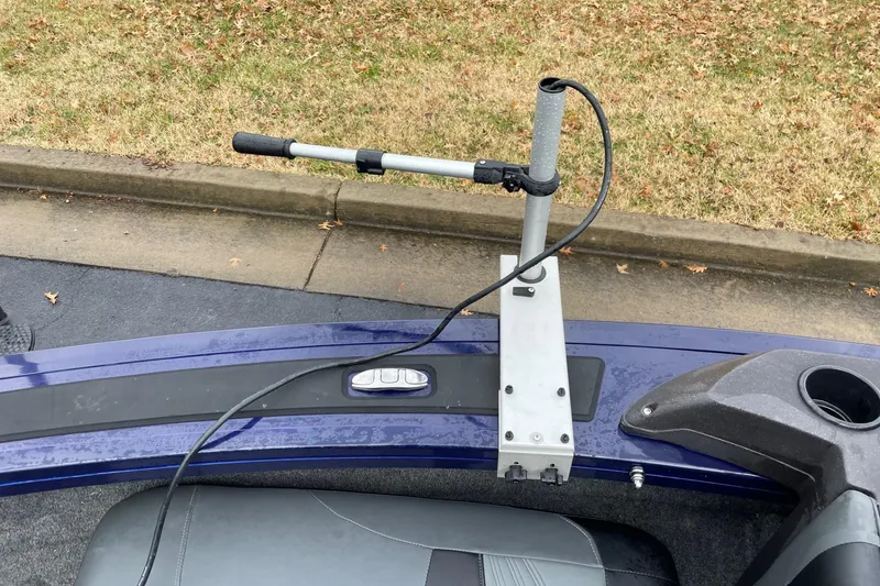 Slide: The Image of 2024 Tracker Targa V-19 Combo boat with mounted fishing rod holder. - 13