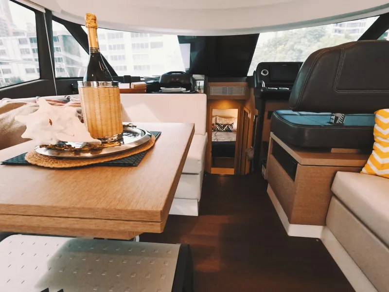Slide: The Image of Luxurious interior of 2020 Prestige 460 yacht with elegant dining setup. - 25