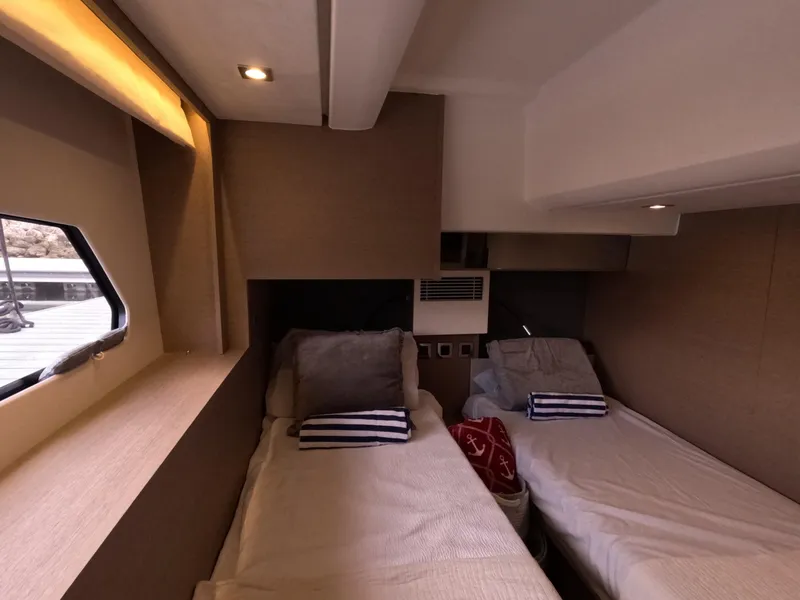 Slide: The Image of Cozy twin cabin in 2020 Prestige 460 yacht with modern design and soft lighting. - 38