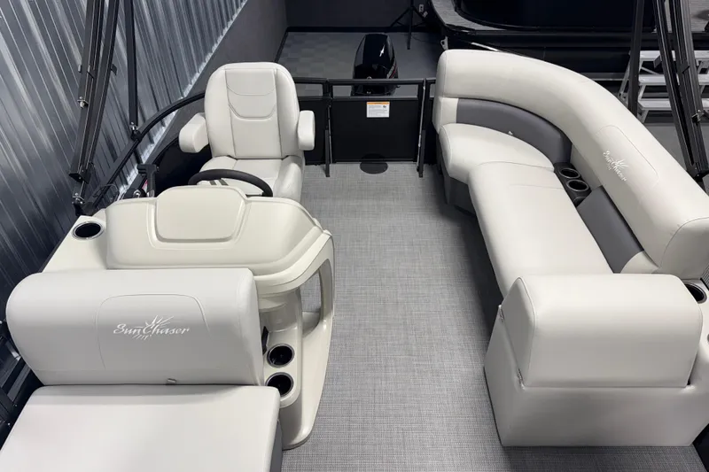 Slide: The Image of 2026 SunChaser Vista 16 Fish boat interior with plush seating and modern design. - 11