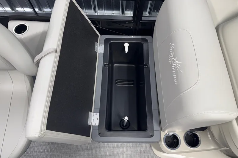 Slide: The Image of SunChaser Vista 16 Fish 2026 boat seat with storage compartment and cup holders. - 14