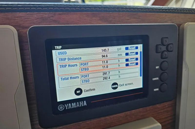 Slide: The Image of Yamaha display showing trip data on a 2022 Cuwater C-32-CB boat. - 41