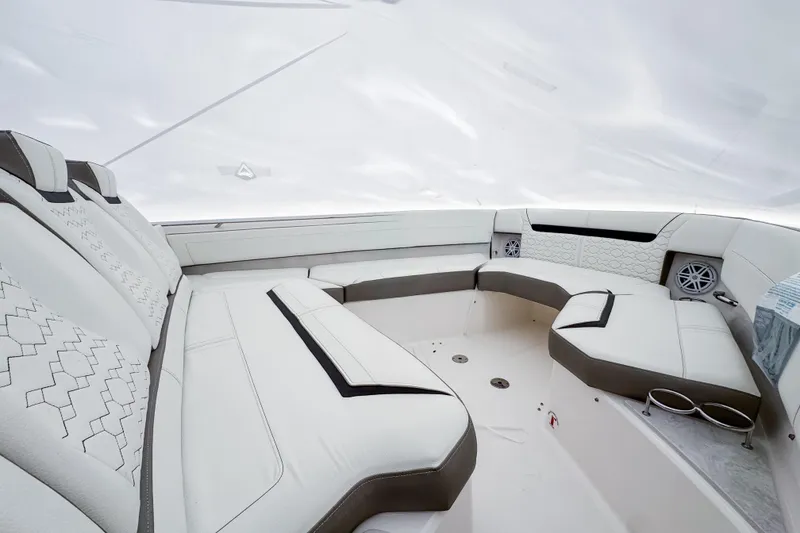Slide: The Image of Luxurious seating area on 2022 Tiara Yachts 43 LS, featuring elegant white upholstery. - 15