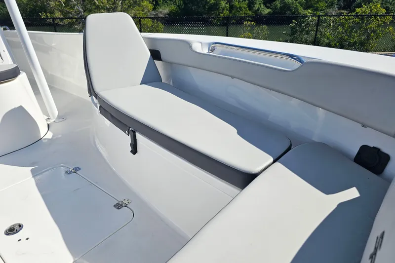 Slide: The Image of 2025 Sea Pro 202 Center Console boat with Suzuki outboard motor and cushioned seating. - 16