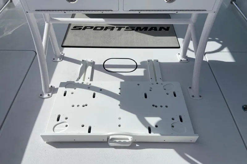 Slide: The Image of 2026 Sportsman Open 252 Center Console boat deck with mounting bracket and storage area. - 15