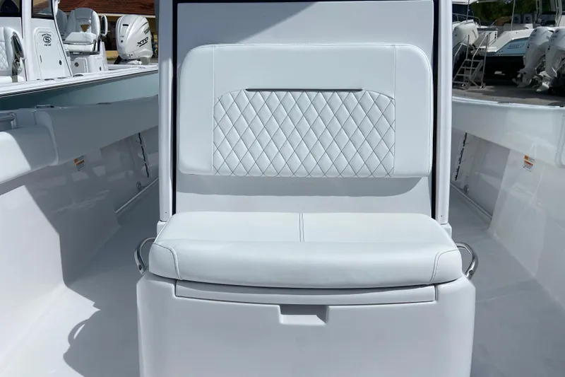 Slide: The Image of 2026 Sportsman Open 252 Center Console boat seat with diamond-stitched upholstery. - 38