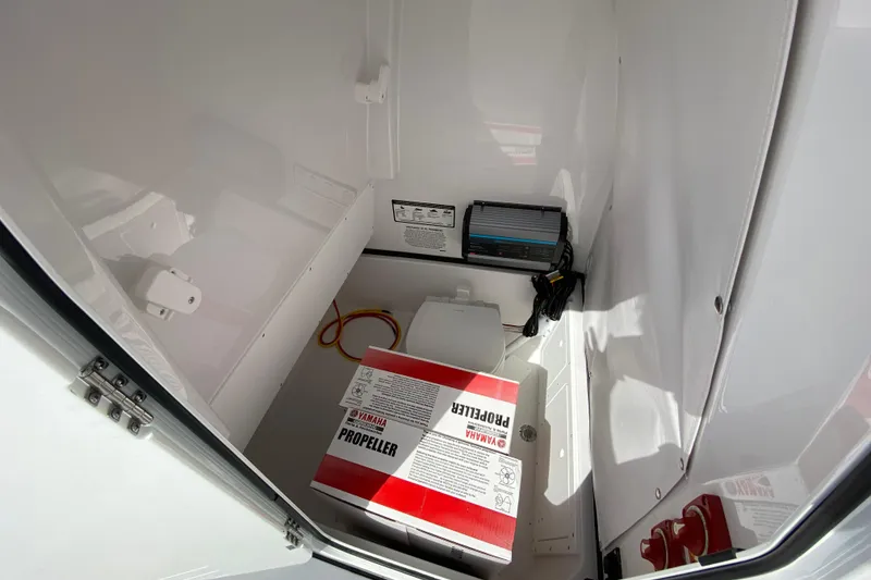 Slide: The Image of Interior of 2026 Sportsman Open 252 Center Console with Yamaha propeller box. - 42