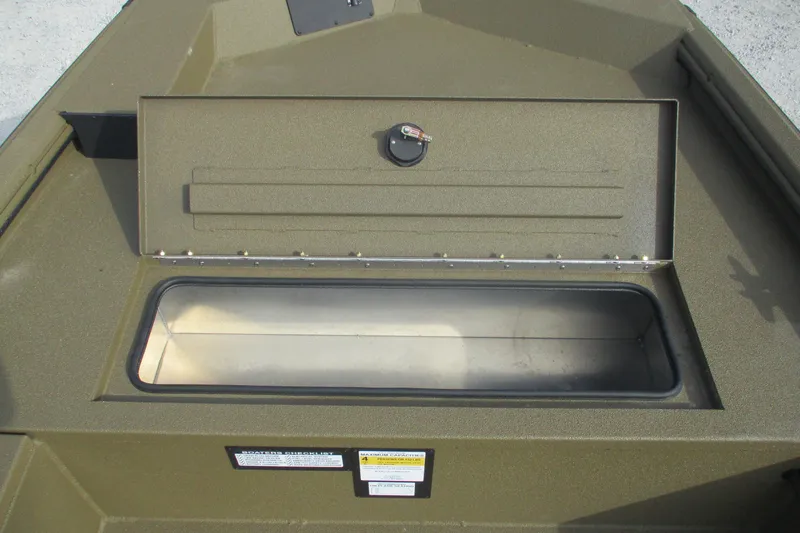 Slide: The Image of Avid 16 Commander 2026 boat storage compartment, open lid, interior view. - 10