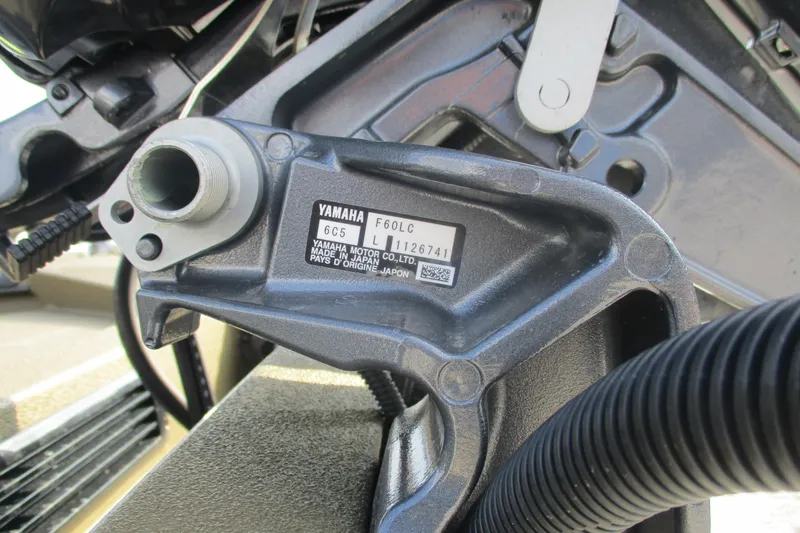 Slide: The Image of Close-up of Yamaha engine part on 2026 Avid 16 Commander boat. - 12