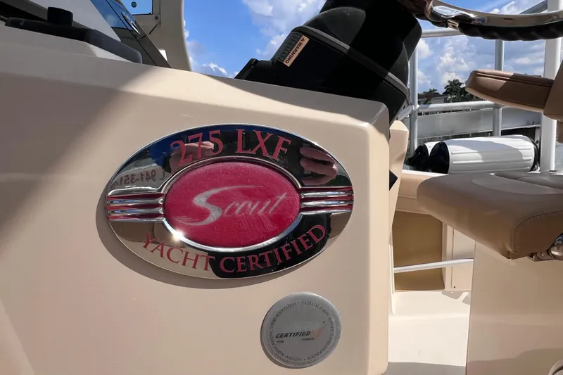 Slide: The Image of 2019 Scout 275 LXF yacht certified emblem on boat console, sunny day. - 37