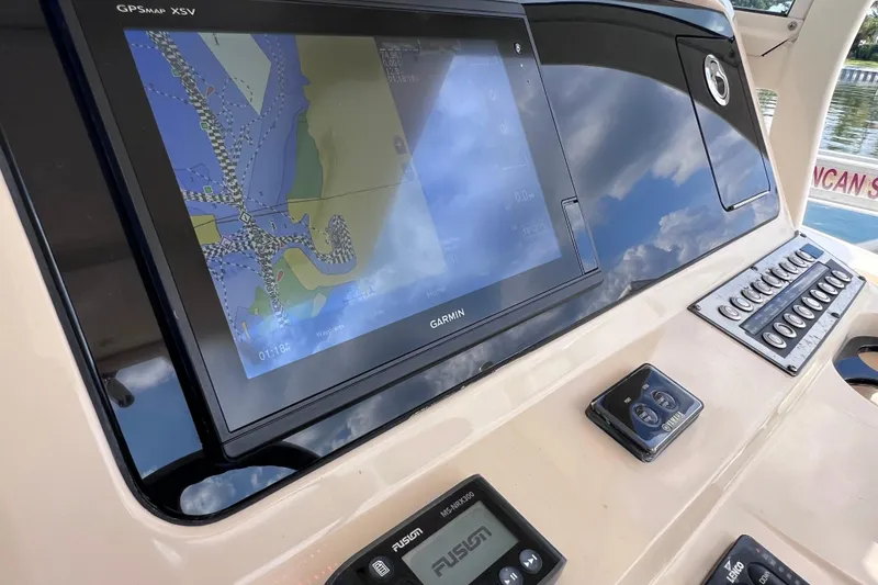 Slide: The Image of 2019 Scout 275 LXF boat dashboard with Garmin GPS navigation system. - 40