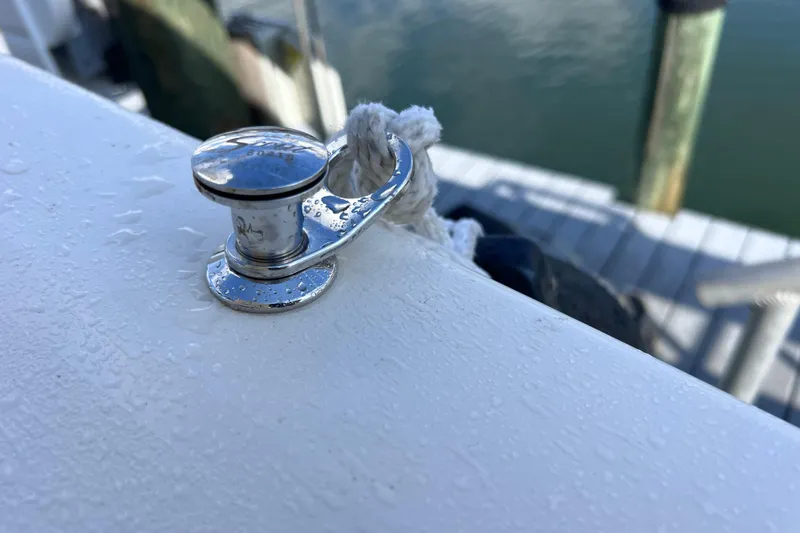 Slide: The Image of Close-up of a cleat on a 2019 Scout 275 LXF boat, dockside. - 64